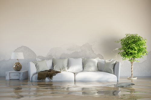 flooded home with couch table and lamp